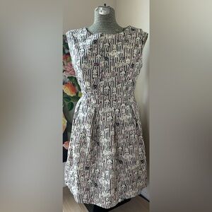 NWOT SM WARDROBE RETRO PRINT DRESS. HIDDEN ZIP, FULLY LINED, TIE BACK. CHARMING